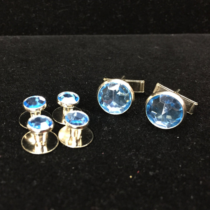 Light Blue center with Silver Edging Set includes 4 Studs and 2 Cufflinks to dresses up your Formal Tuxedo Shirt.