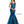 Clarisse 8195 is a mermaid prom dress with a wide v neckline with beaded straps that cross over the open back, and is made in luminous stretch taffeta fabric. (Shown in Peacock)