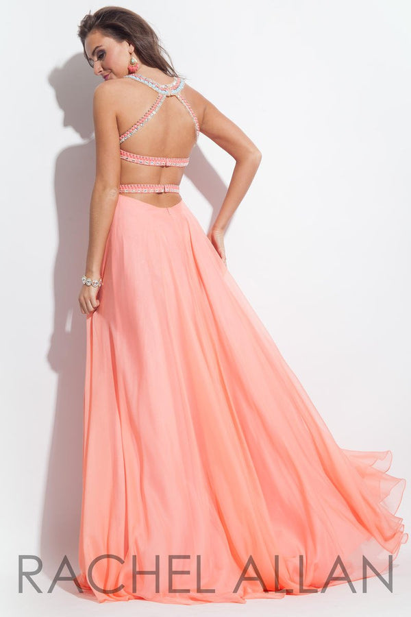 Flowing Coral chiffon a-line dress featuring an illusion sweetheart neckline with beaded accents of coral, white and turquoise and beaded straps across the back.