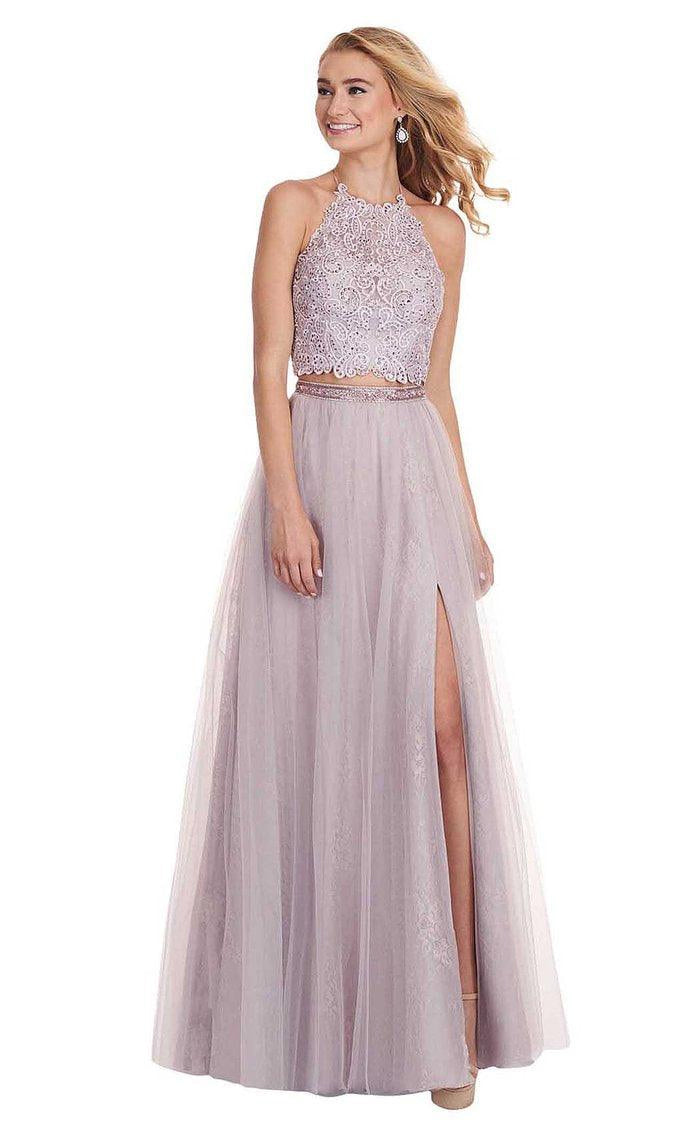 Fresh and flirty embroidered lace and tulle 2-piece gown with a sheer halter neckline, romantic back bow and a soft tulle skirt with a front split.